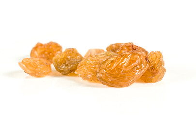 golden Yellow raisins isolated on white background