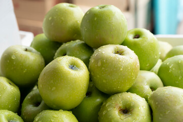 Lots of fresh green apples close together