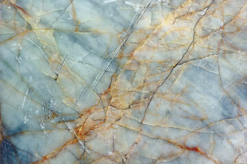 Scratch on the raw marble floor.