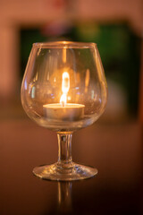 Candle Burning in a Glass Holder