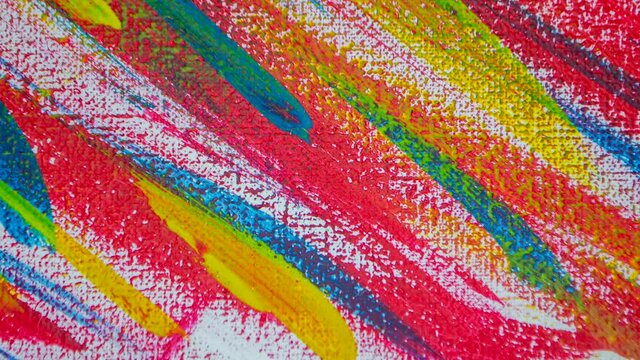 Bright variegated multicolored background of brush strokes with different paint