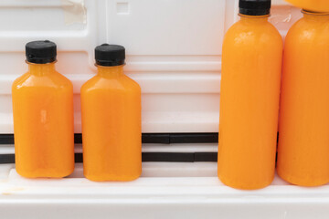 Fresh orange juice in plastic bottle