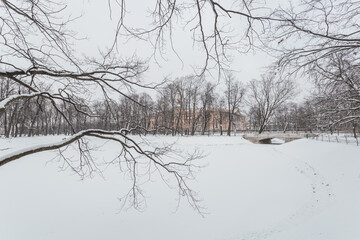 Picturesque winter scenery of snowy park in the centre of Saint Petersburg, Russia.