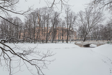 Snowy winter in Mikhailovsky Garden in Saint Petersburg, Russia.