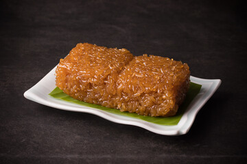 Brown glutinous rice, Thai dessert, black background