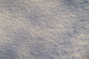 The texture of the snow. Sparkling snow in the sun.