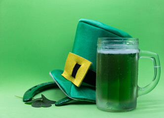 saint patrick's day symbols on green background
