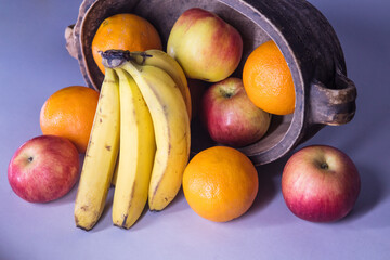 Naklejka na ściany i meble bananas with other types of fruit on the table