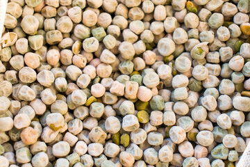 Whole dried green peas close up full frame