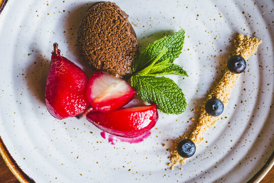 Overhead shot of a tasty dessert with berries and sugar powder