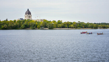 Saskatchewan Legislative Building and three dragon boat on the lake
