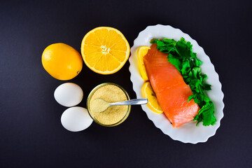 Foods containing collagen and are necessary for its synthesis. Proper nutrition. Black background. Flat lay. Copy space.