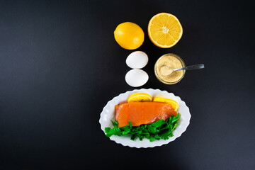 Foods containing collagen and are necessary for its synthesis. Proper nutrition. Black background. Flat lay. Copy space.