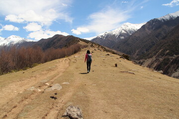 girl trekking in the himalayas