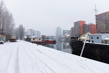 Snowy winter Harbor above River Vltava, Holesovice, the most cool Prague District, Czech Republic