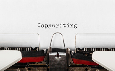 Text Copywriting typed on retro typewriter - obrazy, fototapety, plakaty