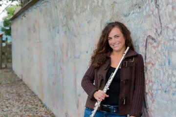Woman with her flute outdoors © dfriend150