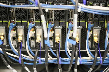 Computer server back view cables, electronic equipment, led panels.