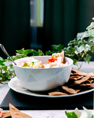 plants and a person eating salad Mexican food tortillas