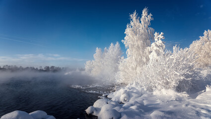 Winter morning at Reftinsky reservoir with snow-covered forest and river, Russia, Ural in January
