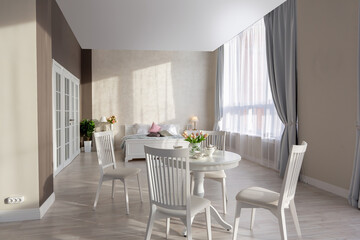Luxurious and expensive interior of an open-plan apartment in light colors. Stylish modern bedroom with minimal design, dining area and guest space.
