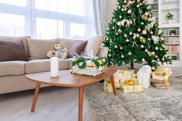 Luxury rich expensive apartment interior in light colors. Stylish contemporary minimalistic design. Full of sun light. A lot of space decorated with Christmas tree