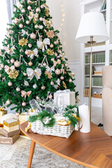 Luxury rich expensive apartment interior in light colors. Stylish contemporary minimalistic design. Full of sun light. A lot of space decorated with Christmas tree