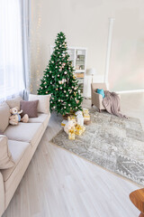 Luxury rich expensive apartment interior in light colors. Stylish contemporary minimalistic design. Full of sun light. A lot of space decorated with Christmas tree