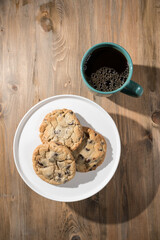 chocolate chip on a plate cookies and coffee