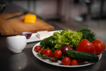 close up of fresh vegetables for greek salad with tomato, cucumber and pepper