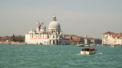 Fototapeta na wymiar View of the Church of Santa Maria della Salute from the boat. Venice. Italy