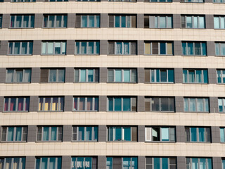 The facade of a modern multi-storey new residential building.