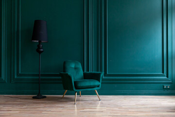 Beautiful luxury classic blue green clean interior room in classic style with green soft armchair....