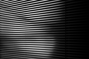 black and white background with architectural detail of horizontal lines.
