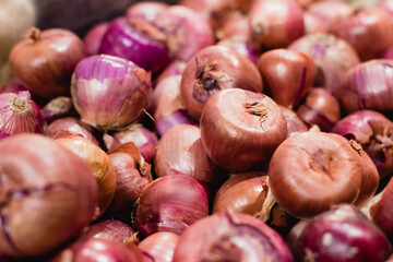 Close up view of organic onions in supermarket