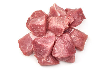 Raw pork pieces, ingredients for goulash, isolated on white background