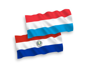 Flags of Paraguay and Luxembourg on a white background