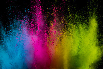 Colored powder isolated on black background. Abstract background.