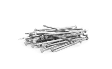 Pile of metal nails on white background
