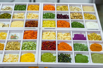 Dried vegetables in wooden box, onions, beets, carrots, pumpkin, bay leaf. Superfoods, herbs.