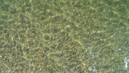 beach sand bottom ripple of water waves reflection texture