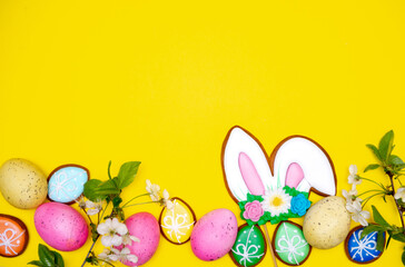 Easter pastry background. Colorful icing Easter cookies, with different symbols and decorations. Traditional easter sweets flat background