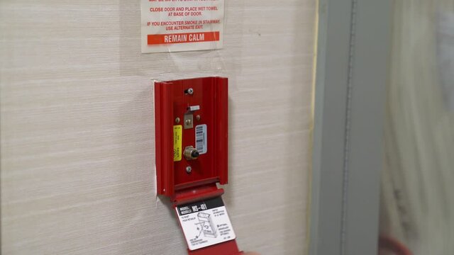 Pulling fire alarm station for fire prevention and safety testing inspection during fire drill