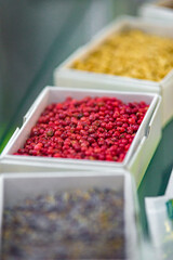 Dried vegetables in boxes, onions, beets, carrots, pumpkin, bay leaf. Superfoods, herbs