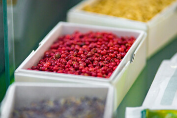 Dried vegetables in boxes, onions, beets, carrots, pumpkin, bay leaf. Superfoods, herbs