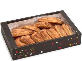 Puff pastry with raspberry filling in the box and on white background