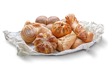 Composition various kinds of bakery products on paper on a white background.