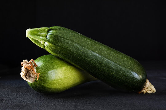 garden fresh zucchini with dried blossoms attached