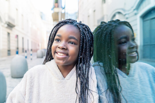 beautiful African girl portrayed on glass wall