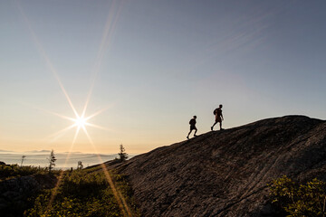 Couple hikes along Appalachian Trail to summit in Maine, sunrise